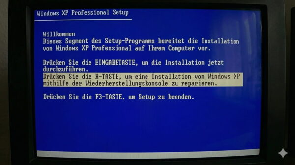 Blauer Windows XP Setup-Bildschirm mit der Option R-Taste drücken für die Wiederherstellungskonsole